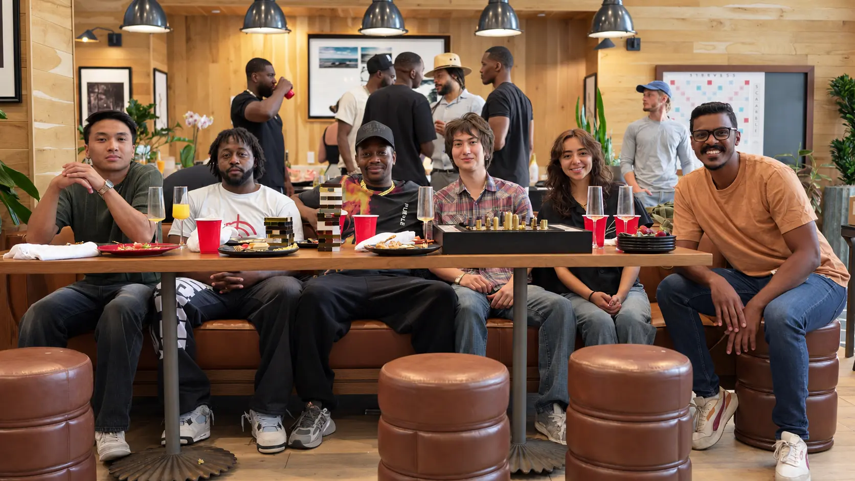 The nuumusic community gathered around a long brunch table